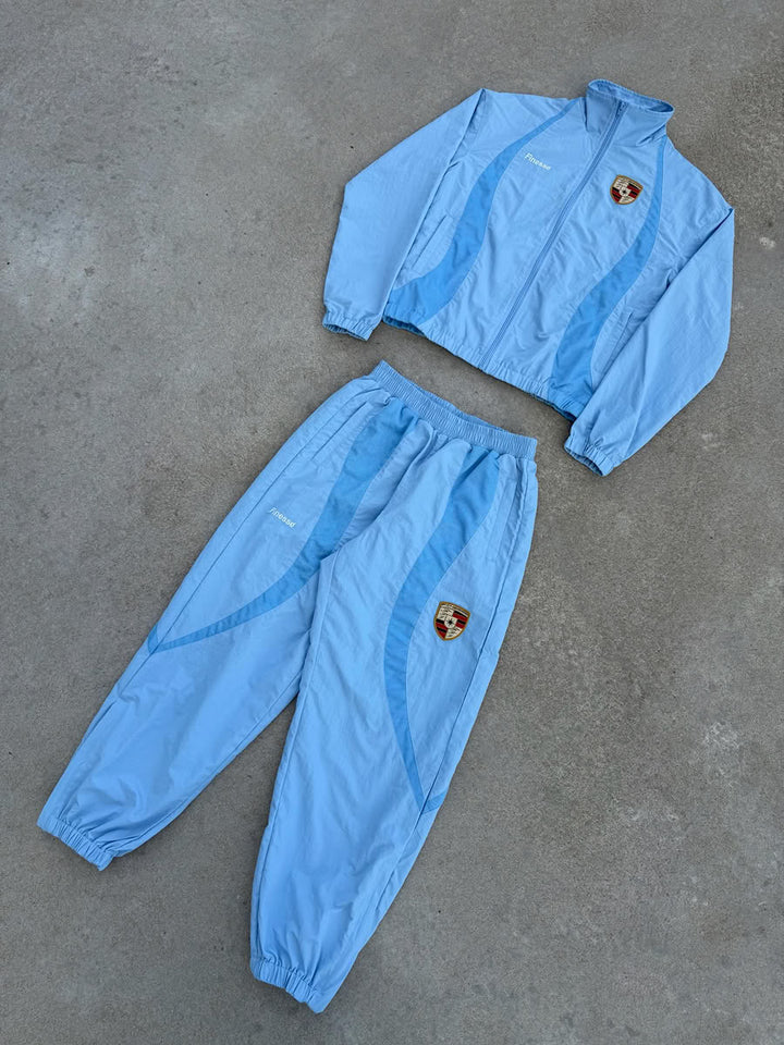 911 Jogger Blue - flat lay - Finesse