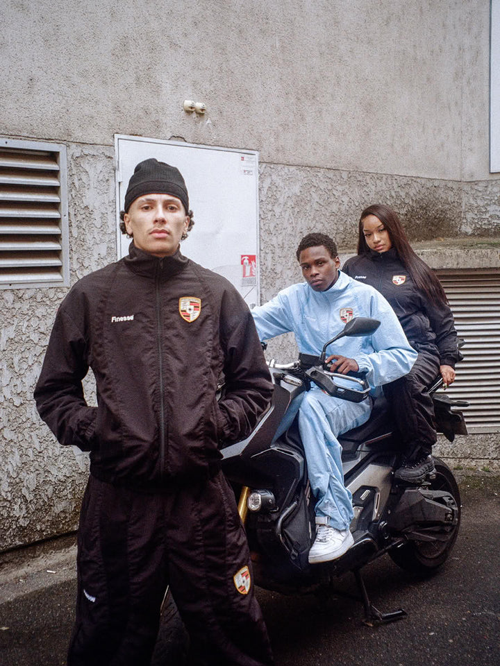 Model wearing the 911 Zip Jacket Black - Finesse lookbook