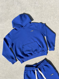 Finesse Air Cotton Hoodie bleu présenté à plat en packshot