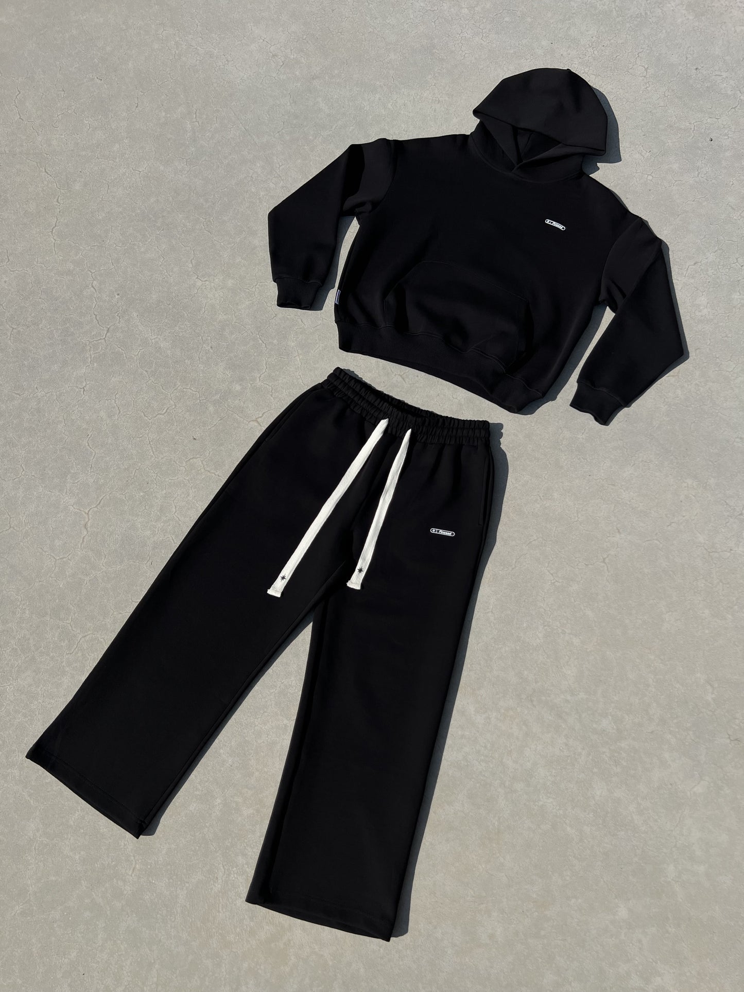 Ensemble complet Finesse Air Cotton noir présenté à plat