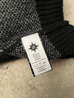 Étiquette du Finesse Mohair Black Bird montrant la composition du vêtement.