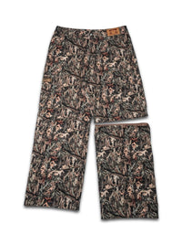 Pantalon cargo camouflage avec jambes détachables, modulable en short, design militaire moderne et fonctionnel.