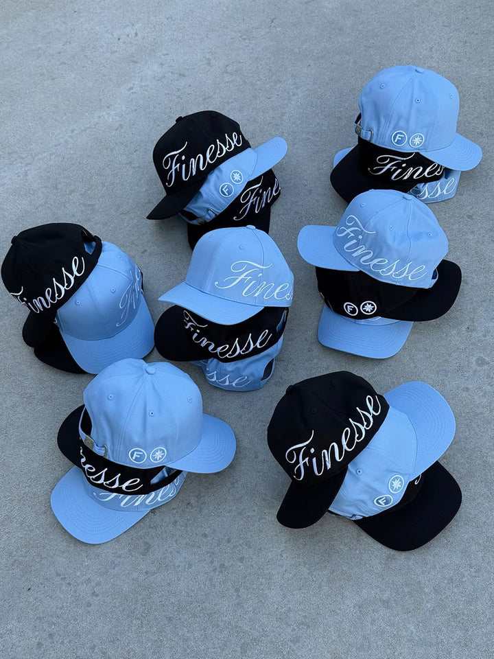 Sign Cap Baby Blue - flat lay - Finesse