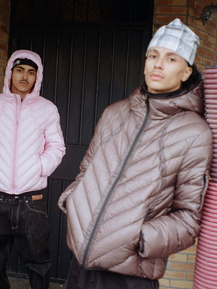 Model wearing the Slim Puffer Jacket Dark Grey - Finesse lookbook